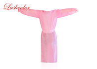 ピンクの使い捨て可能な外科衣類によって非編まれる防護衣の入れ墨の付属品